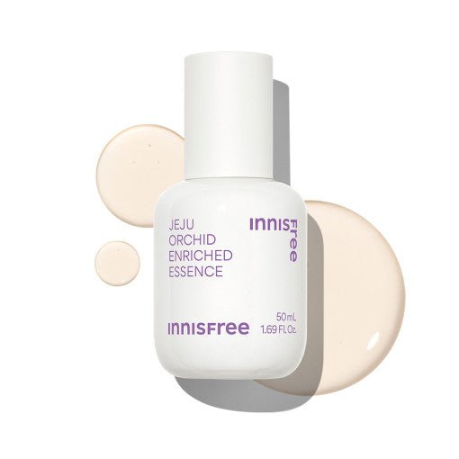 White bottle of Jeju Orchid Enriched Essence with smooth beige serum drops highlighting anti-aging support benefits