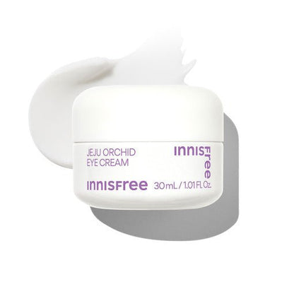 White jar of hydrating orchid eye cream with soft cream texture swatch on a bright white background