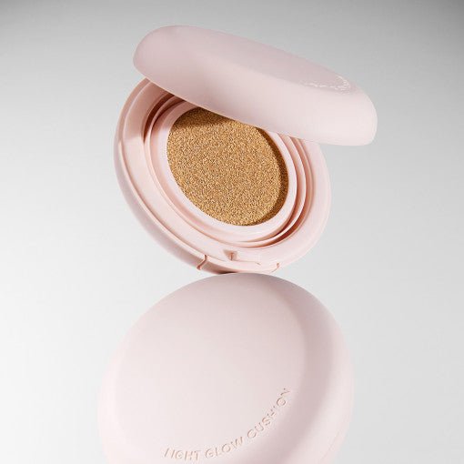 Open pale pink compact showing cushion foundation for natural glowing skin finish