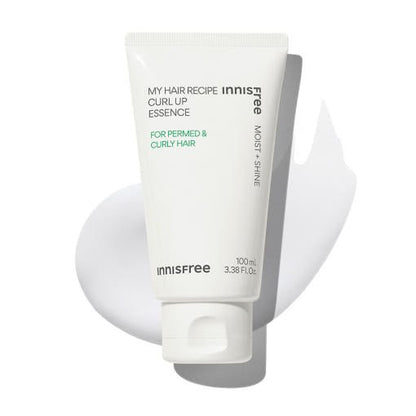White tube of light moisturizing curl essence with text emphasizing shine and hydration for curly hair