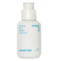 White ampoule bottle with minimalist blue lettering highlighting retinol and cica for moisture amplification benefits