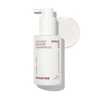 White pump bottle of pore cleansing oil with smooth oil texture on a clean white background