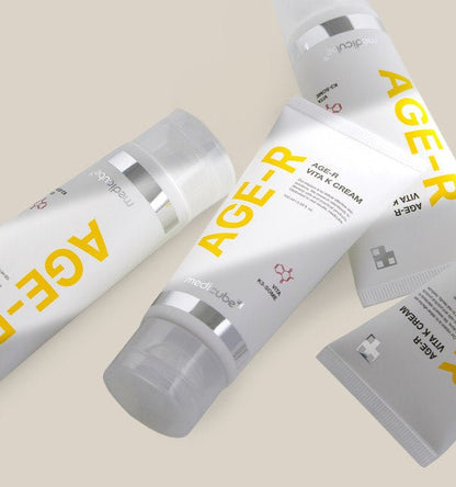 medicube AGE-R Vita K Cream 100ml in white tube with yellow text offering redness relief for sensitive skin care