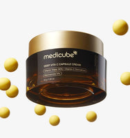 medicube Deep Vita C Capsule Cream 55g jar with golden lid and floating yellow capsules for hydration boost