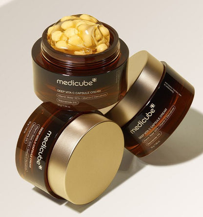 medicube Deep Vita C Capsule Cream 55g jars with visible vitamin C capsules highlighting hydration boost benefits