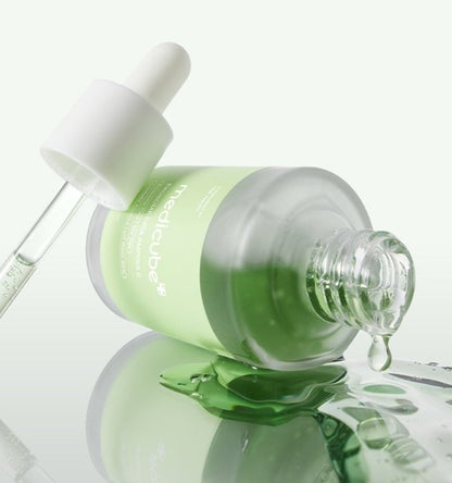 medicube Exosome Cica Ampoule 30ml green bottle with dropper releasing serum for rapid skin relief care