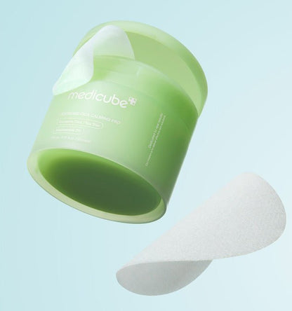 medicube Exosome Cica Calming Pad 150ml/100 Pads in green container with translucent calming pads for gentle exfoliation