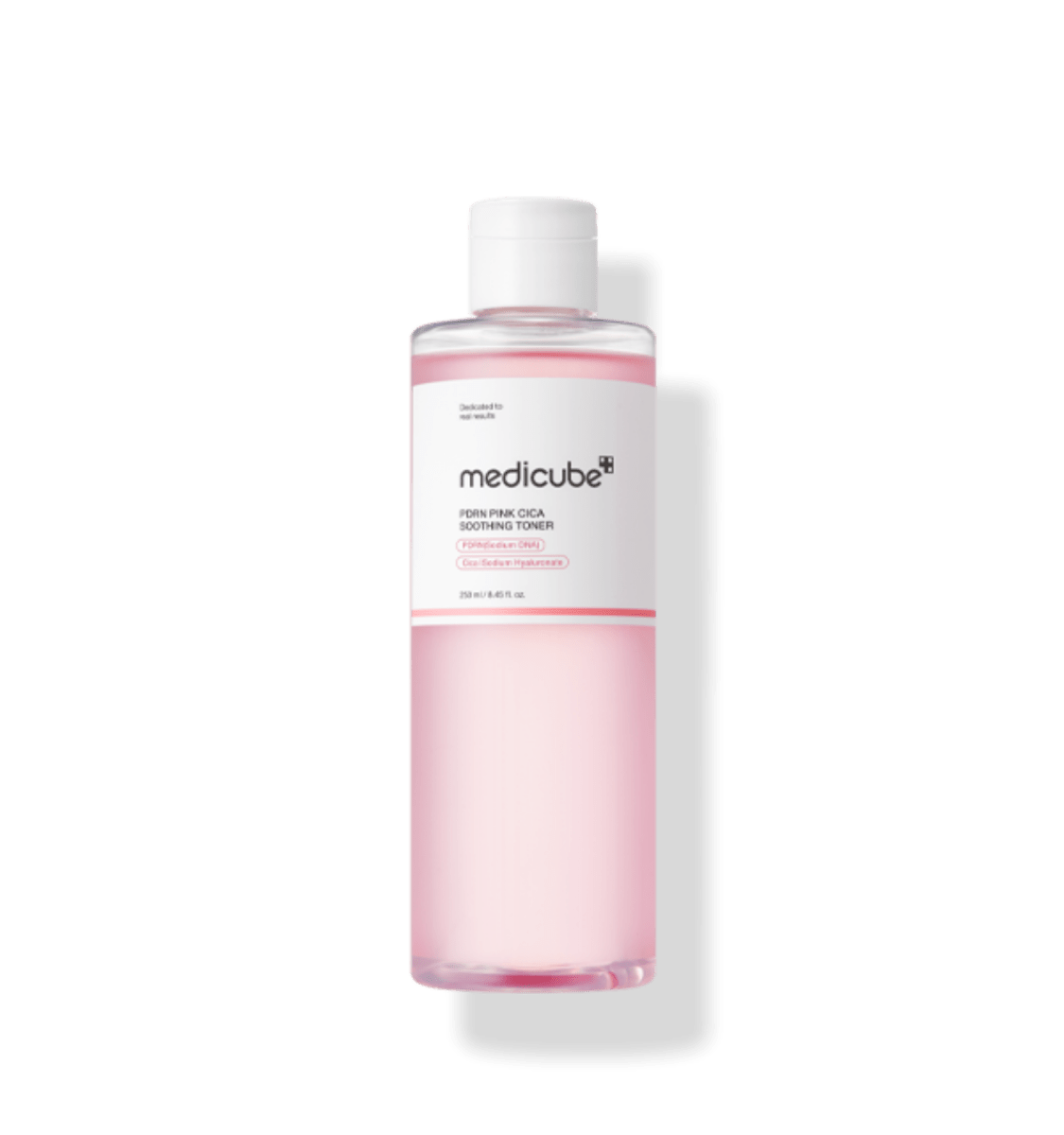 medicube PDRN Pink Cica Soothing Toner 250ml in clear bottle with gentle pink liquid and brightening effect label
