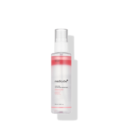medicube PDRN Pink Glutathione Serum Mist 100ml in clear bottle with pink serum layer for enhanced elasticity care