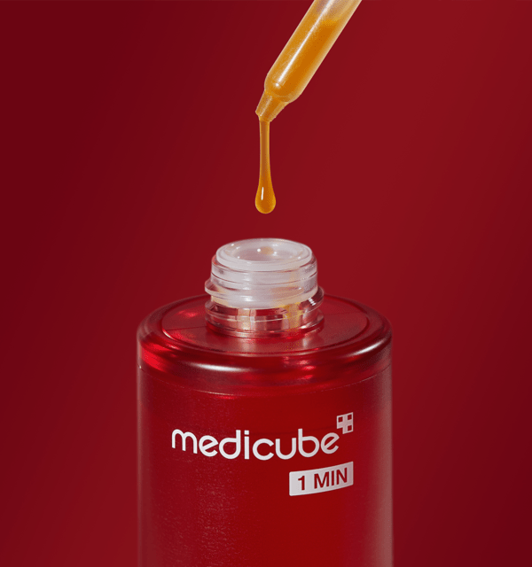 medicube Red Acne Succinic Acid Peel 40g red bottle with dropper dispensing acne-clearing peel serum