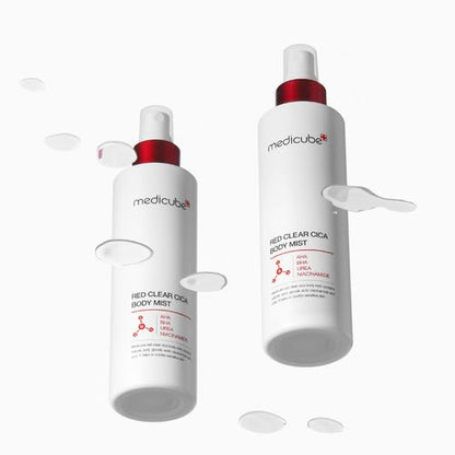 medicube Red Clear Cica Body Mist 200ml white bottles with red caps surrounded by clear liquid drops for clear skin benefits
