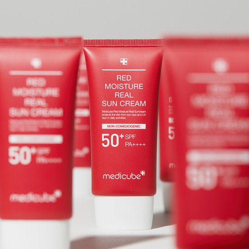 medicube Red Moisture Real Sun Cream 50ml red tube emphasizing daily protection with SPF 50+ PA++++ in bold white text