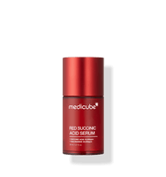medicube Red Succinic Acid Serum 30ml in sleek red bottle for effective acne relief treatment