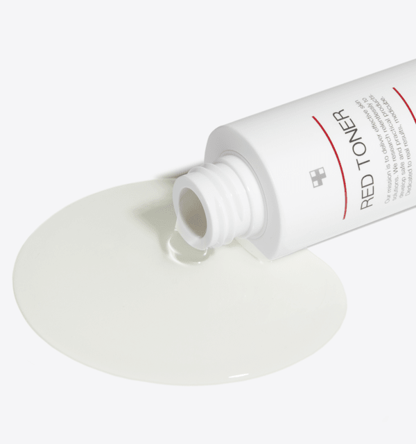 medicube Red Toner 2.0 100ml with clear liquid flowing from white bottle for acne treatment care