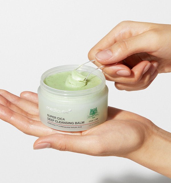 medicube Super Cica Deep Cleansing Balm 100ml in jar with light green balm and spatula for thorough cleansing use