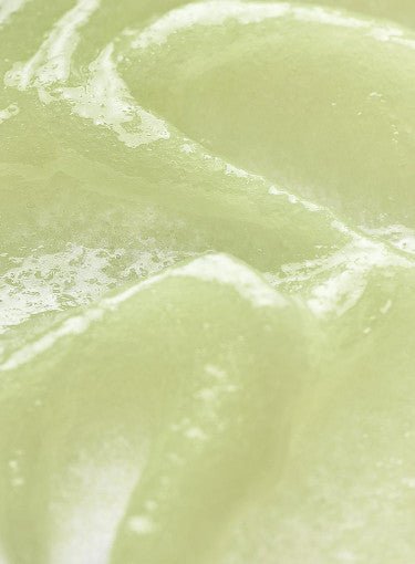 Light green gel serum texture with smooth, glossy surface highlighting moisturizing and UV protection benefits