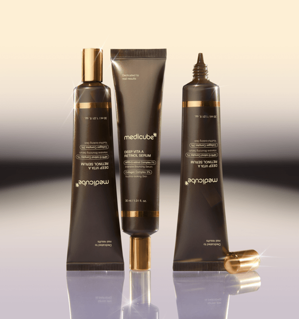 medicube Deep Vita A Retinol Serum 30ml in sleek brown tubes with gold accents highlighting collagen boosting benefits