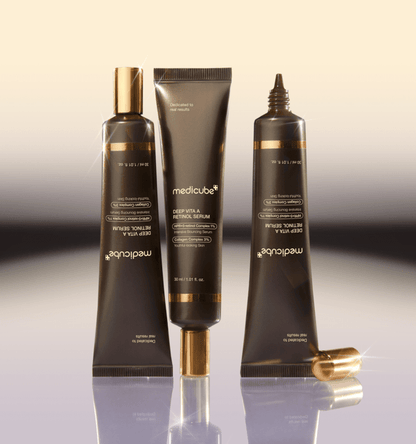 medicube Deep Vita A Retinol Serum 30ml in sleek brown tubes with gold accents highlighting collagen boosting benefits