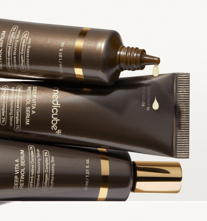 medicube Deep Vita A Retinol Serum 30ml in dark brown tubes with gold accents and anti-aging collagen boost formula