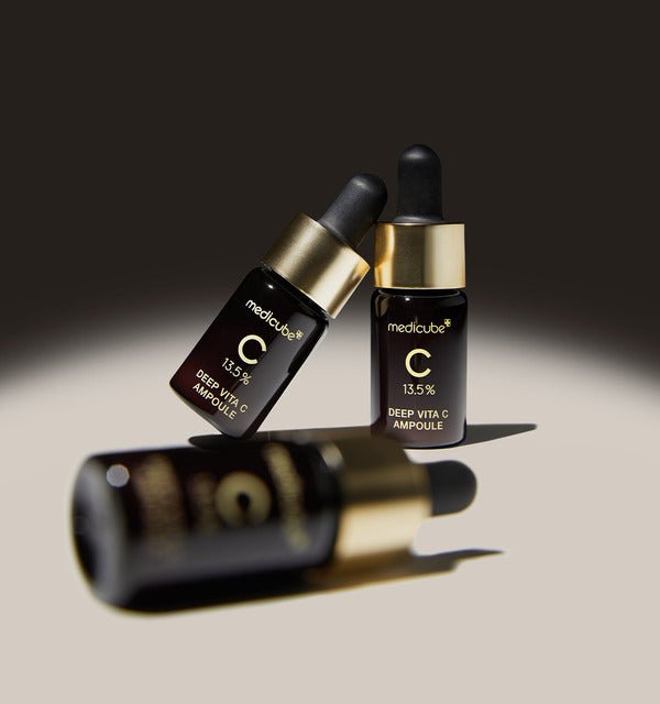 medicube Deep Vita C Ampoule 2.0 (10g x 3ea) three dark glass bottles with gold caps for brightening care
