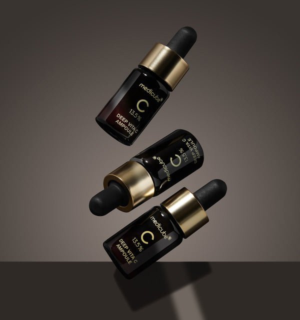 medicube Deep Vita C Ampoule 2.0 (10g x 3ea) three dark amber glass bottles with gold caps and droppers for brightening care