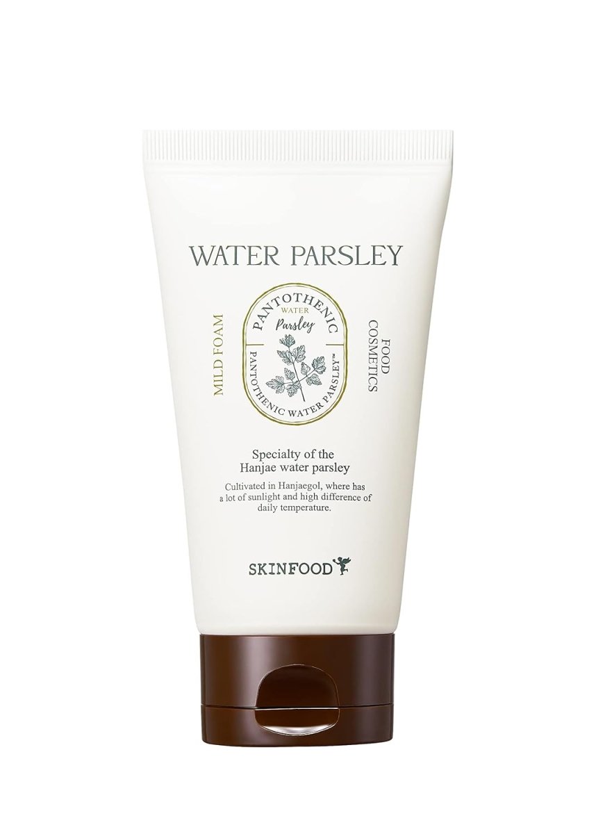 White squeeze tube of mild foam cleanser with brown cap and botanical parsley illustration on label
