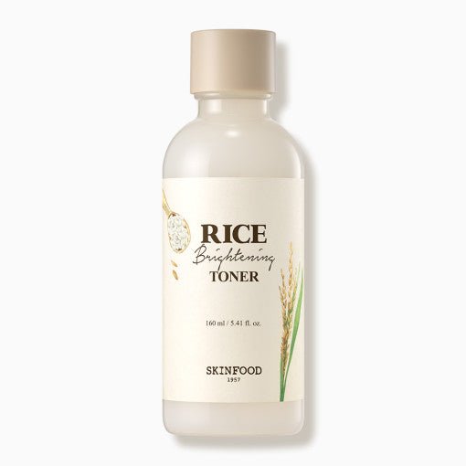 Minimalist frosted bottle of rice brightening toner with beige cap and natural grain illustration on white label