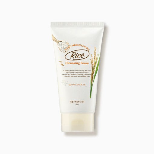 White tube of gentle rice-infused brightening cleansing foam with natural grain and plant design on white background