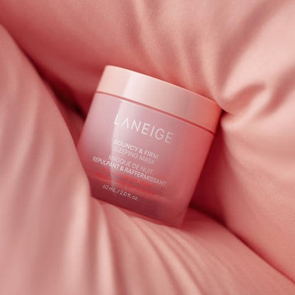 LANEIGE Bouncy & Firm Face Sleeping Mask 60ml in pink jar nestled in soft fabric for wrinkle reduction care