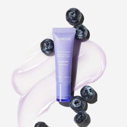 LANEIGE Lip Glowy Balm 10g in blueberry scent with rich moisture displayed alongside fresh blueberries and balm swatch