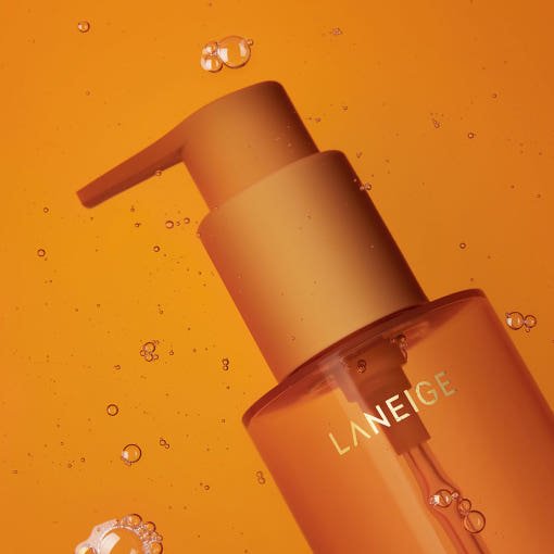LANEIGE Perfect Renew Nourishing Oil-To-Foam Cleanser 200ml in amber pump bottle with clear liquid and bubbles for efficient cleansing