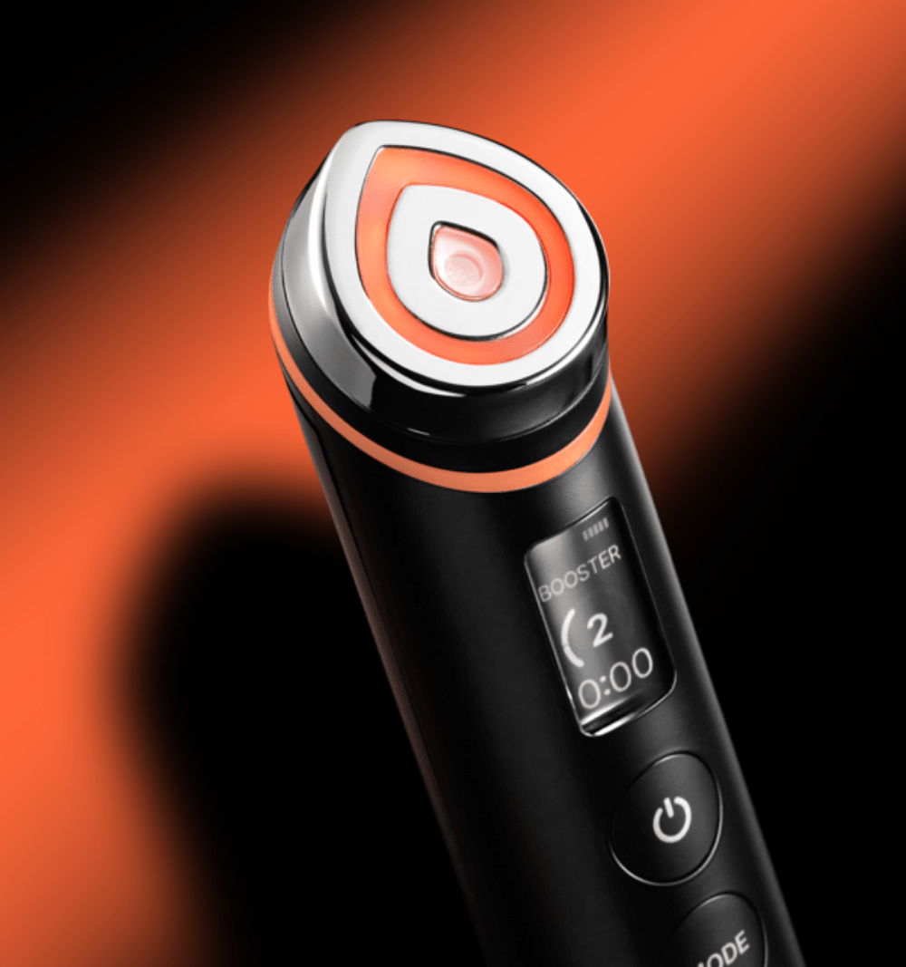medicube AGE-R Booster Pro #Black device with sleek black body and orange-accented technology design for advanced skincare