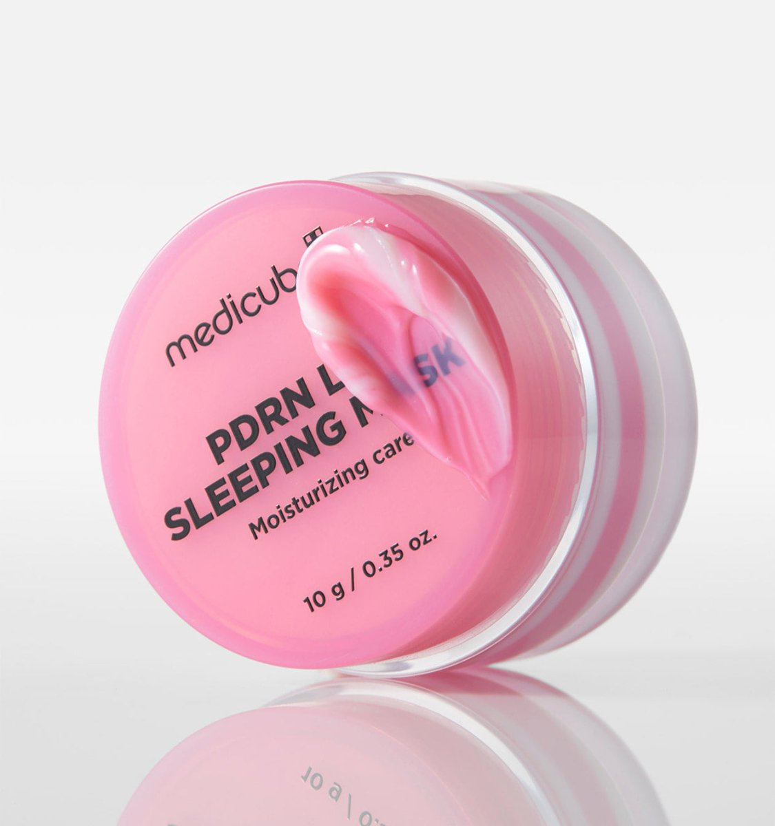 medicube PDRN Lip Sleeping Mask 10ml in pink jar with creamy texture promoting hydration boost for lips care