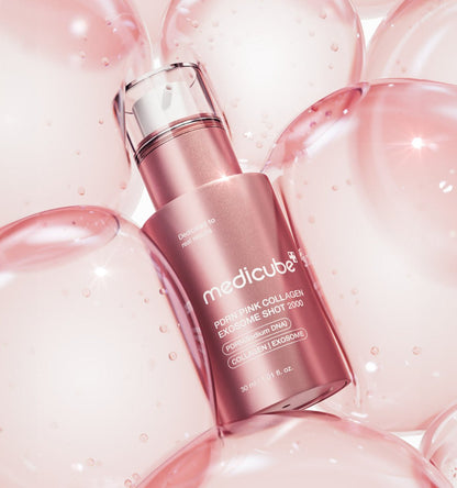 medicube PDRN Pink Collagen Exosome Shot 2000 30ml in pink bottle surrounded by glossy pink bubbles representing enhanced radiance