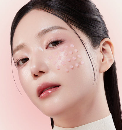 medicube PDRN Pink Collagen Exosome Shot 2000 30ml shown as pink serum drops on radiant cheek skin