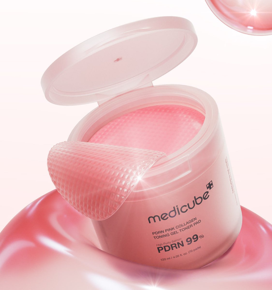 medicube PDRN Pink Collagen Gel Toner Pad 120ml/70pads container open showing textured pink pads for natural renewal care
