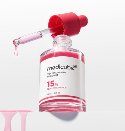 medicube TXA Niacinamide 15% Serum 30ml in clear bottle with red dropper for brightening effect and skin tone improvement