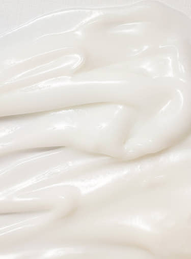 Smooth and creamy white moisturizer texture showcasing rich hydration and gentle skin nourishment benefits