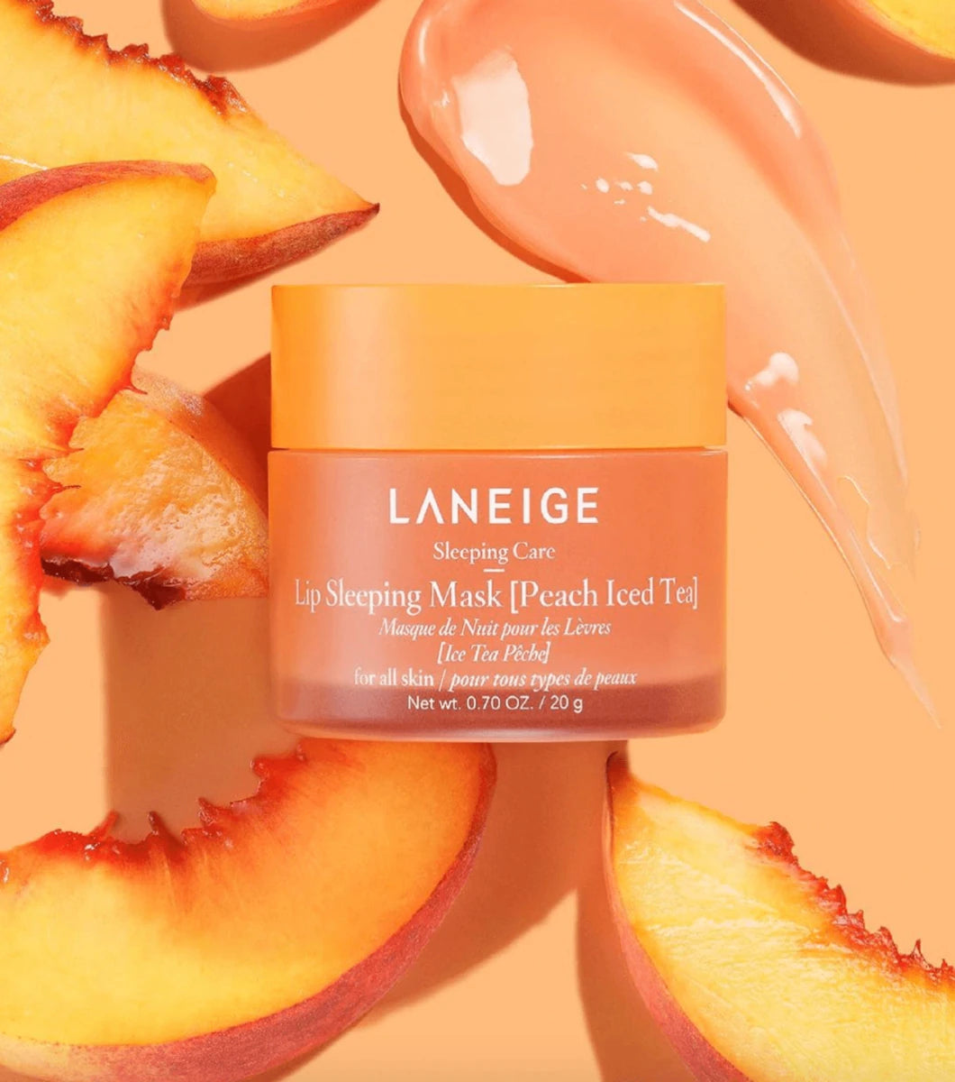 LANEIGE Lip Sleeping Mask EX 20ml #Peach Iced Tea jar surrounded by fresh peach slices with creamy peach mask texture nearby