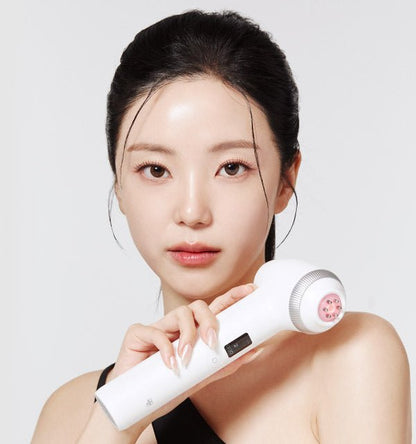 medicube AGE-R Ultra Tune 40.68 white handheld device with digital display held by model for elasticity boost