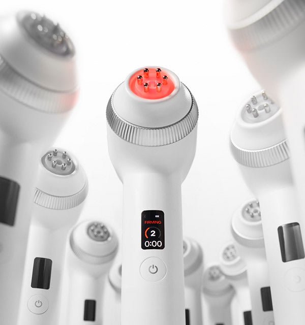 medicube AGE-R Ultra Tune 40.68 white handheld device with red glowing tip for elasticity boost therapy