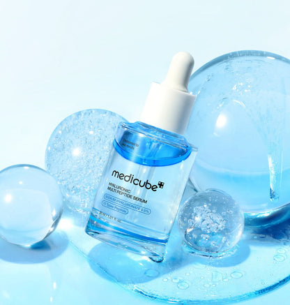 medicube Hyaluronic Multi Peptide Serum 30ml in clear blue bottle with dropper for intense hydration care
