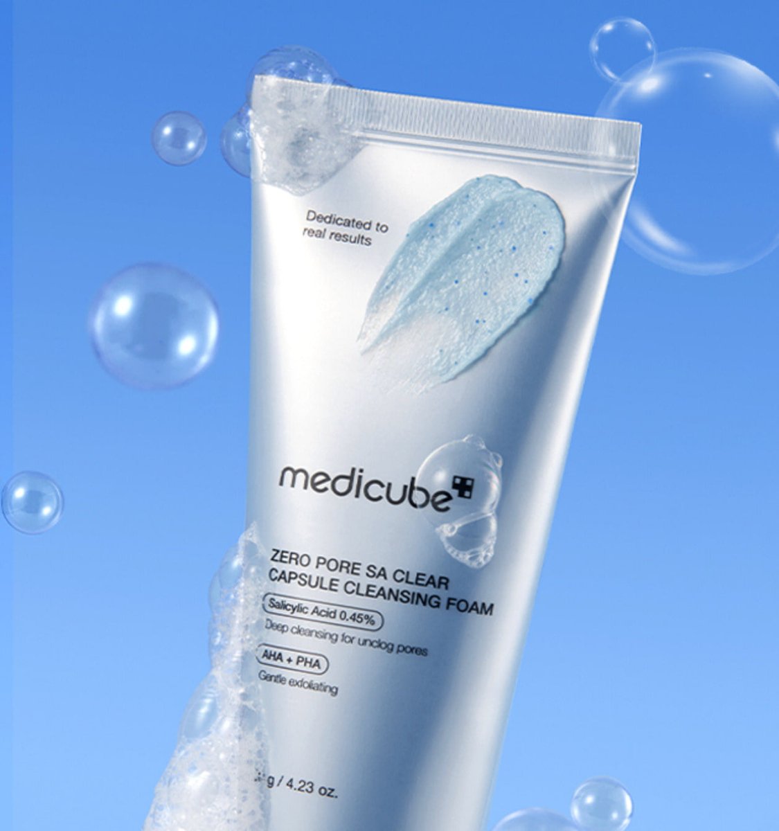 medicube Zero Pore Capsule Cleansing Foam 120g white tube with blue foam texture and bubbles symbolizing deep cleansing