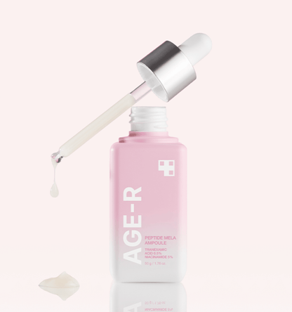 medicube AGE-R Peptide Mela Ampoule 50g in pink bottle with dropper dispensing serum for freckle treatment care