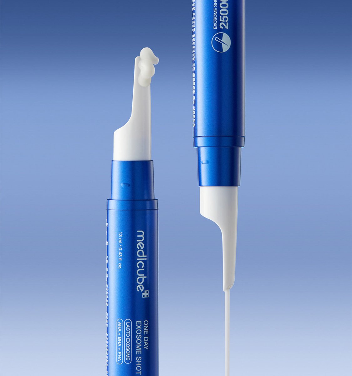 medicube One Day Exosome Shot 25000 13ml blue applicator dispensing serum for intensive pore care on blue background