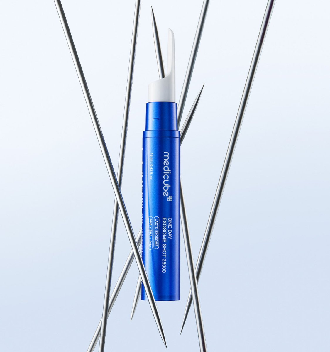 medicube One Day Exosome Shot 25000 13ml in sleek blue bottle with white applicator for intensive pore care