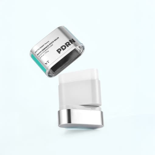 VT PDRN Essence Stick Balm 9.5g with firming action in sleek silver and white packaging on light background