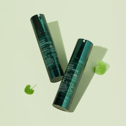 VT Pro Cica Reedle Shot 100 50ml in dark green bottles shown with fresh green leaves for hydration boost