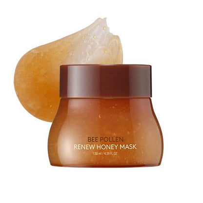 Amber jar of moisturizing honey mask with gel texture containing visible honey particles on white background