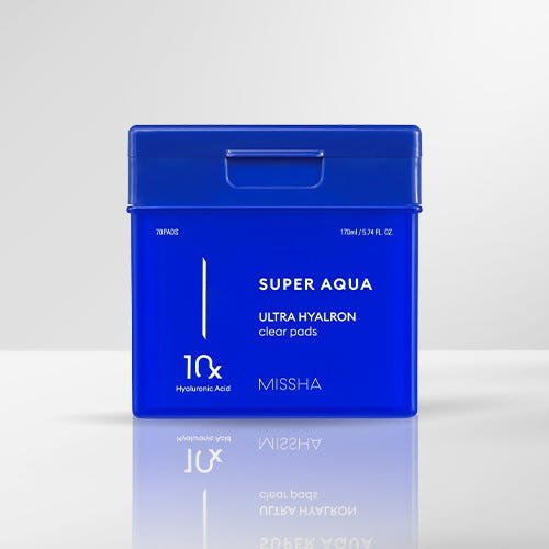 Blue rectangular container of hydrating clear pads with hyaluronic acid on a reflective white surface background